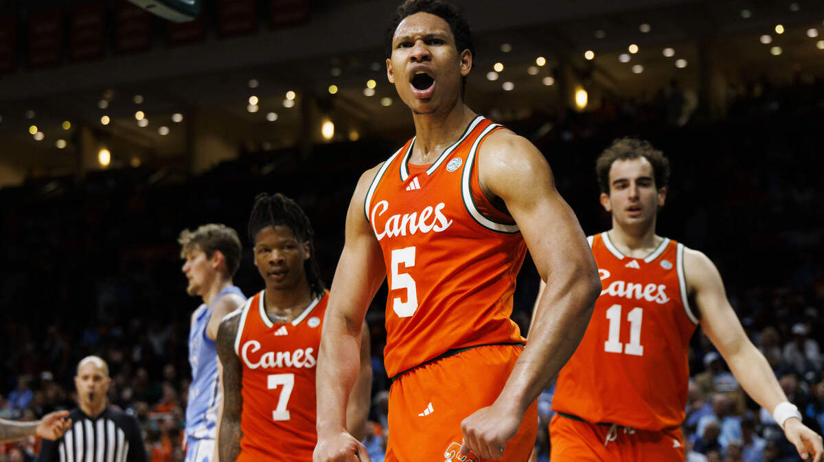 Miami Hurricanes forward Malik Reneau (5) reacts after making a basket during the first half of a game against the North Carolina Tar Heels on Tuesday, Feb. 10, 2026, at the Watsco Center in Coral Gables, Fla.
